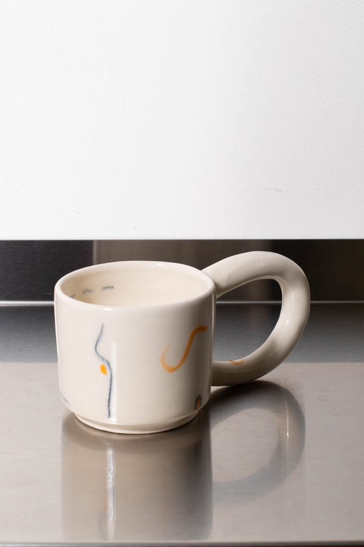 3. White mug – CARMEL ROWDEN
