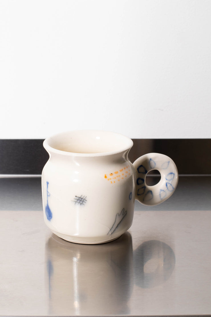 2. White mug – CARMEL ROWDEN