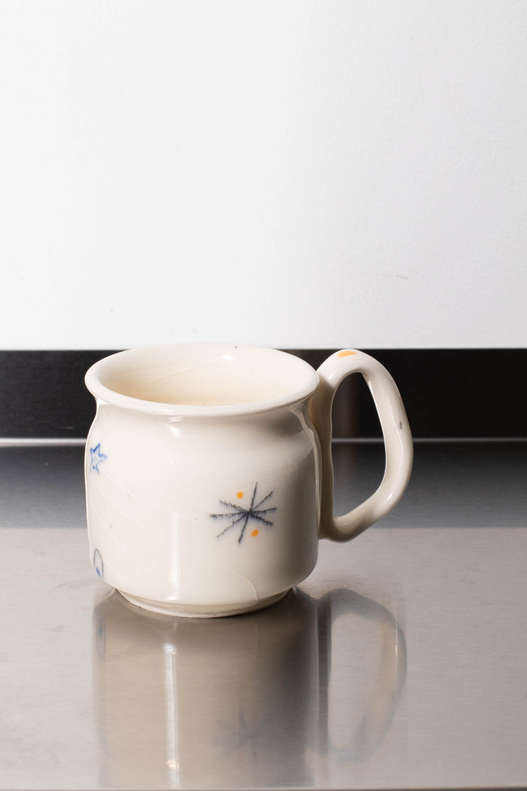 4. White mug – CARMEL ROWDEN